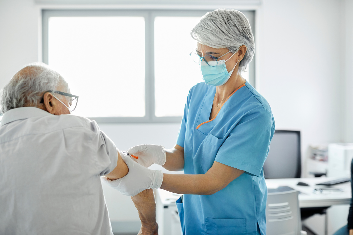 Nurse Injecting COVID-19 Vaccine.